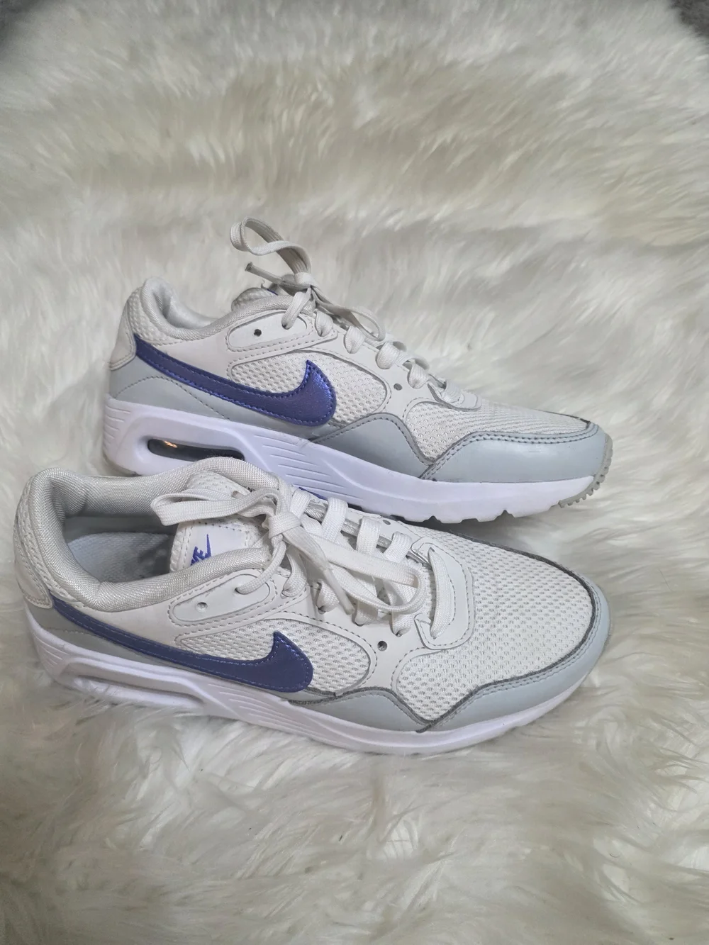 Nike Women’s Cream Sneakers with Metallic Blue Swoosh